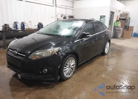 2014 Ford Focus Titanium из США, поврежденный, VIN 1FADP3J27EL148933